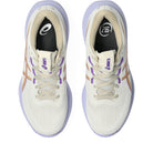 White running shoes with purple accents on a white background