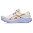 White running shoe with orange and purple accents on a white background