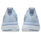 Light blue running shoes with 'PureGEL' branding on a white background