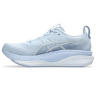 Light blue running shoe with white sole on a white background