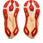 Top view of red and beige shoe insoles on a white background