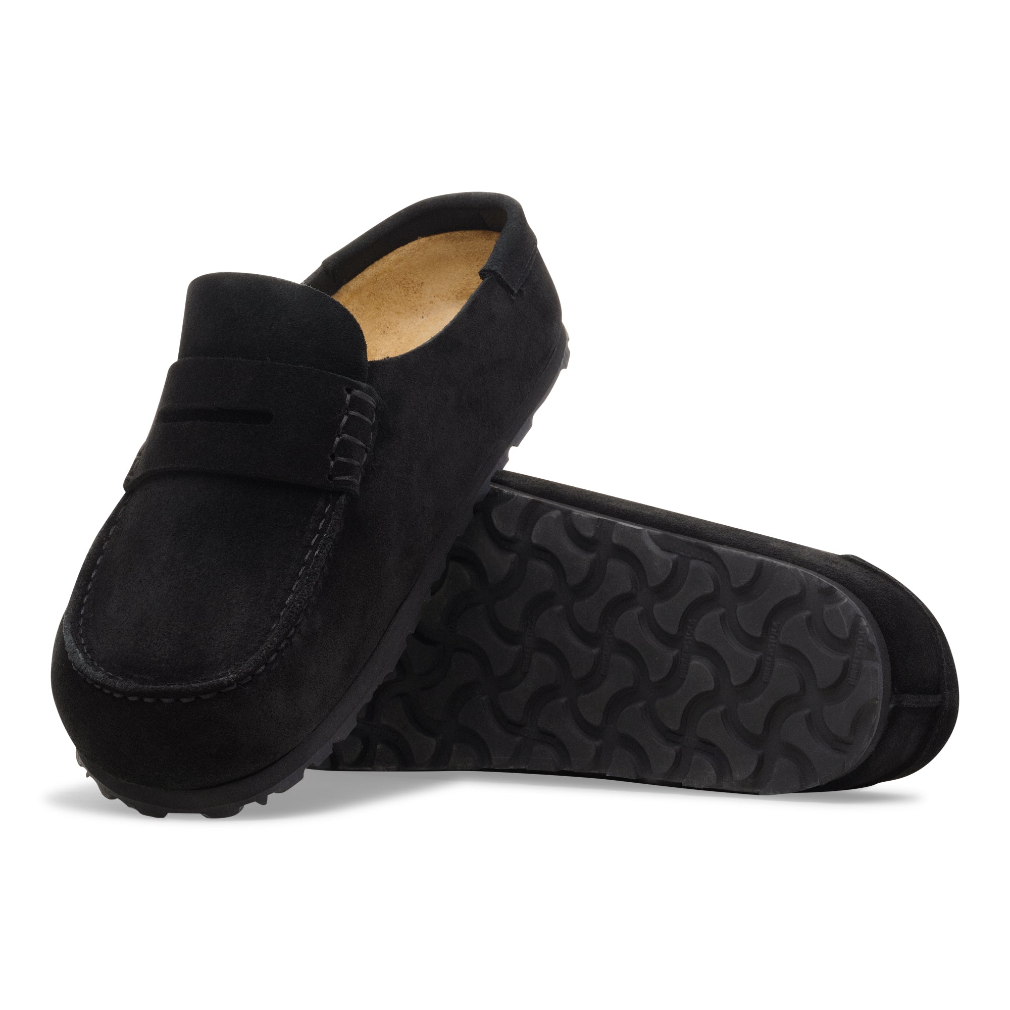 Black loafers with a textured sole on a white background