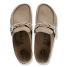 Pair of beige Birkenstock sandals on a white background