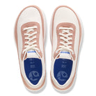 Pair of pink and white sneakers with blue soles on a white background