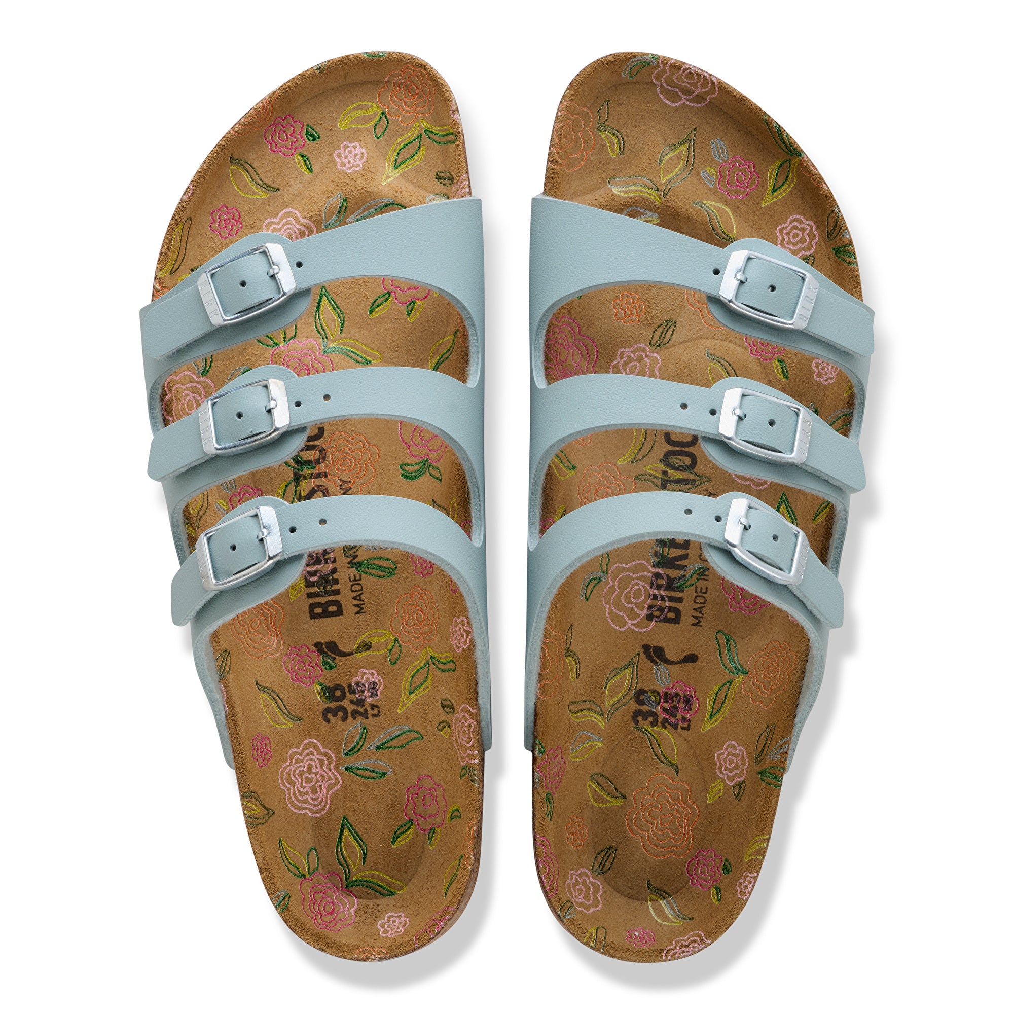 Pair of sandals with floral pattern on a white background