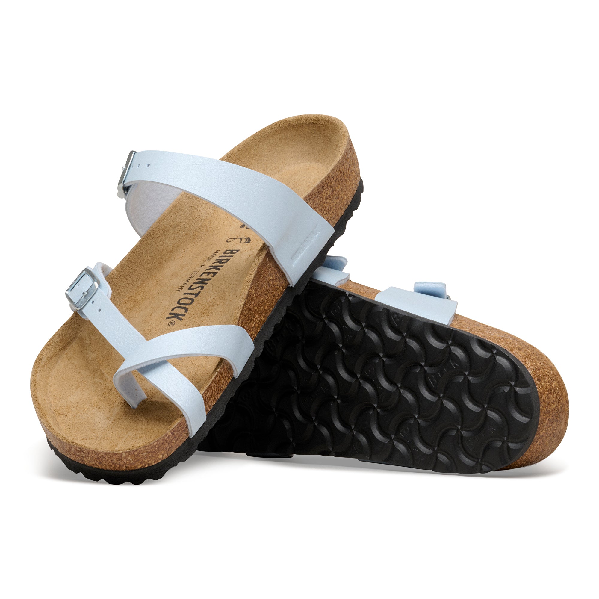 Pair of Birkenstock sandals with white straps on a white background