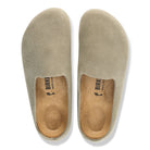 Pair of beige shoe insoles with 'Birkenstock' branding on a white background