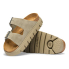 Beige sandal with cork insole on a white background