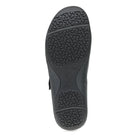 Black shoe sole with tread pattern on a white background