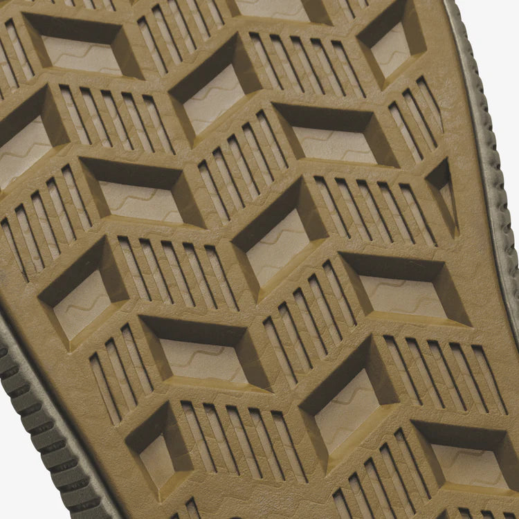 Close-up of a textured brown sole with geometric pattern
