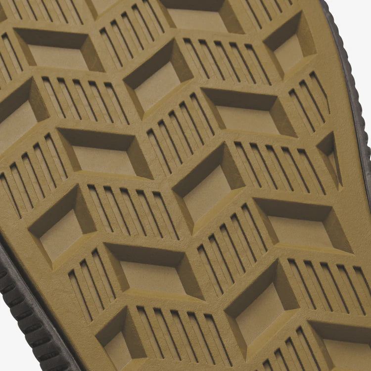 Close-up of a textured brown surface with geometric pattern