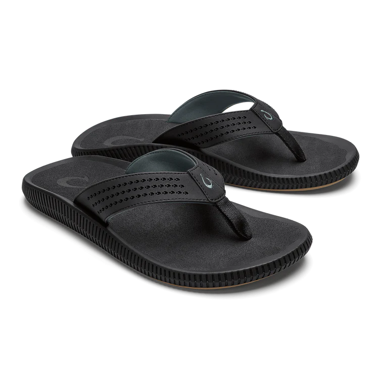 Pair of black sandals on a white background