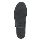 Black sole of a shoe with 'Dansko' branding on a white background