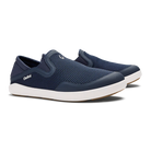 Navy slip-on shoes with white soles on a white background