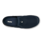 Navy slip-on shoe with 'OluKai' branding on a white background