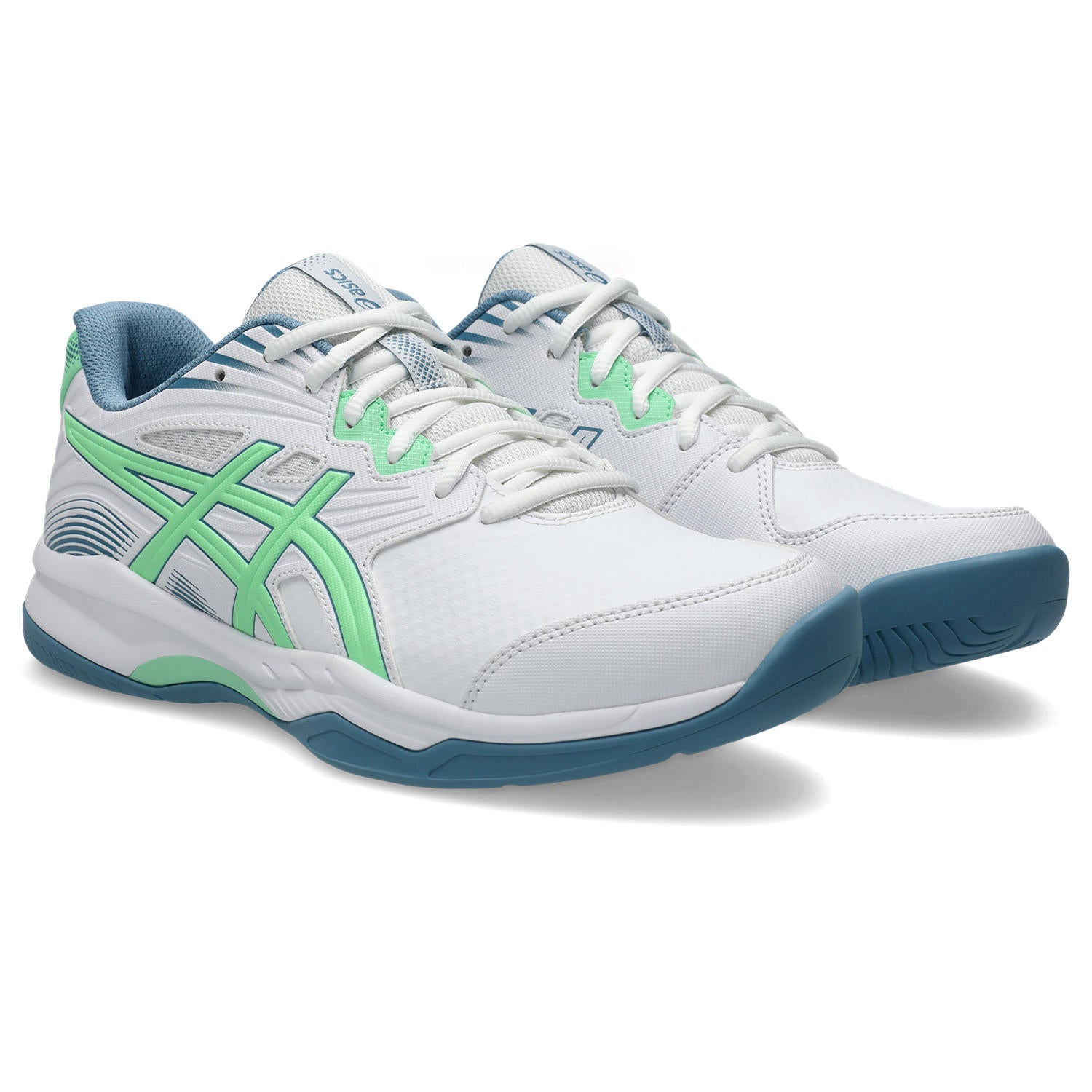 White sneakers with green and blue accents on a white background