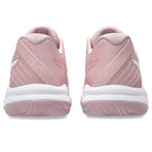 Pink athletic shoes with white soles on a white background