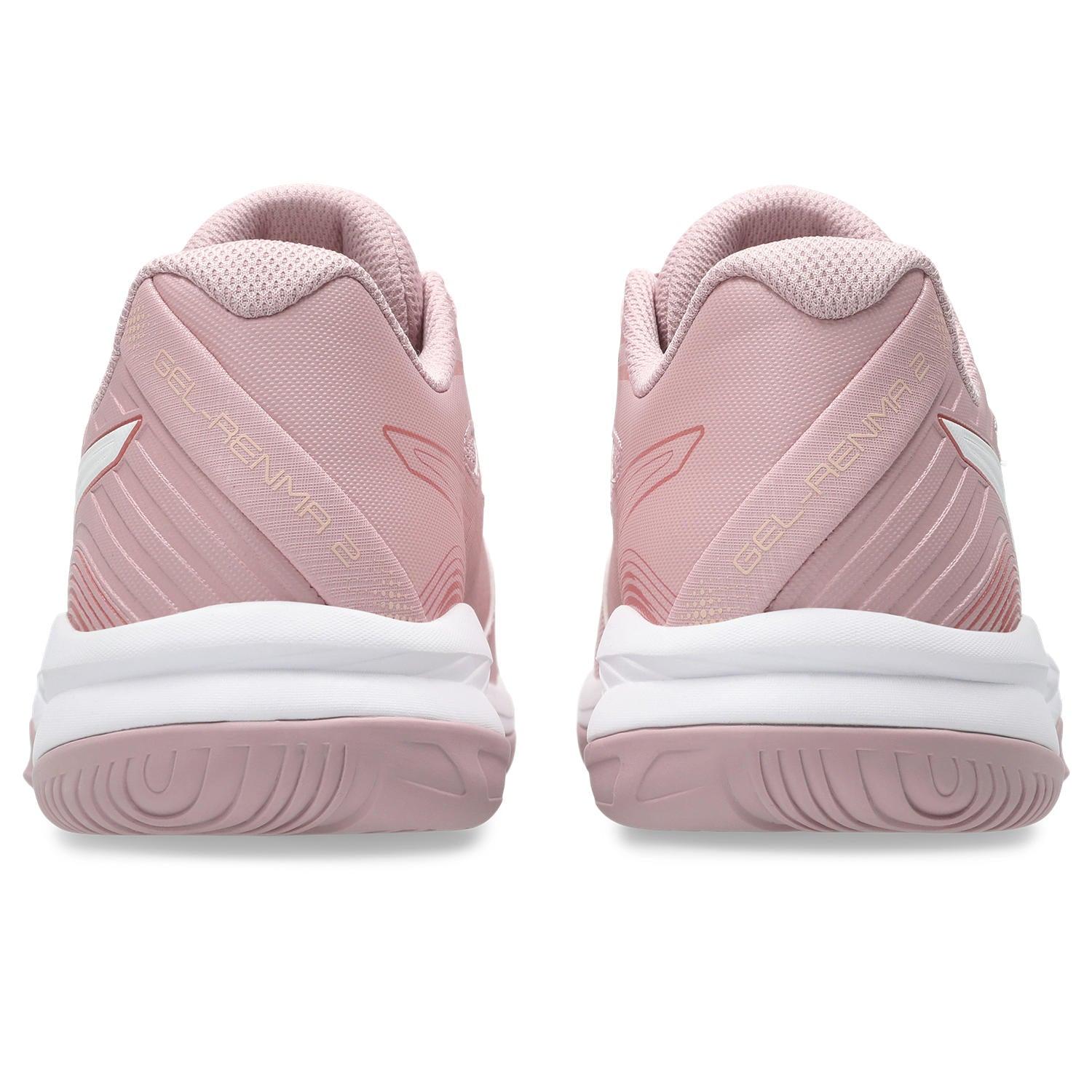 Pink athletic shoes with white soles on a white background