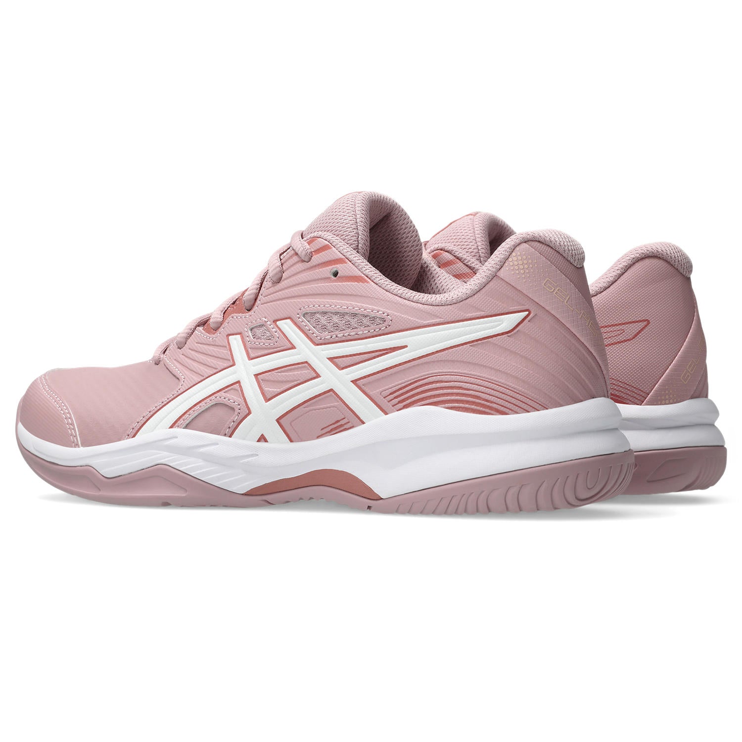 Pink athletic shoe with white sole on a white background
