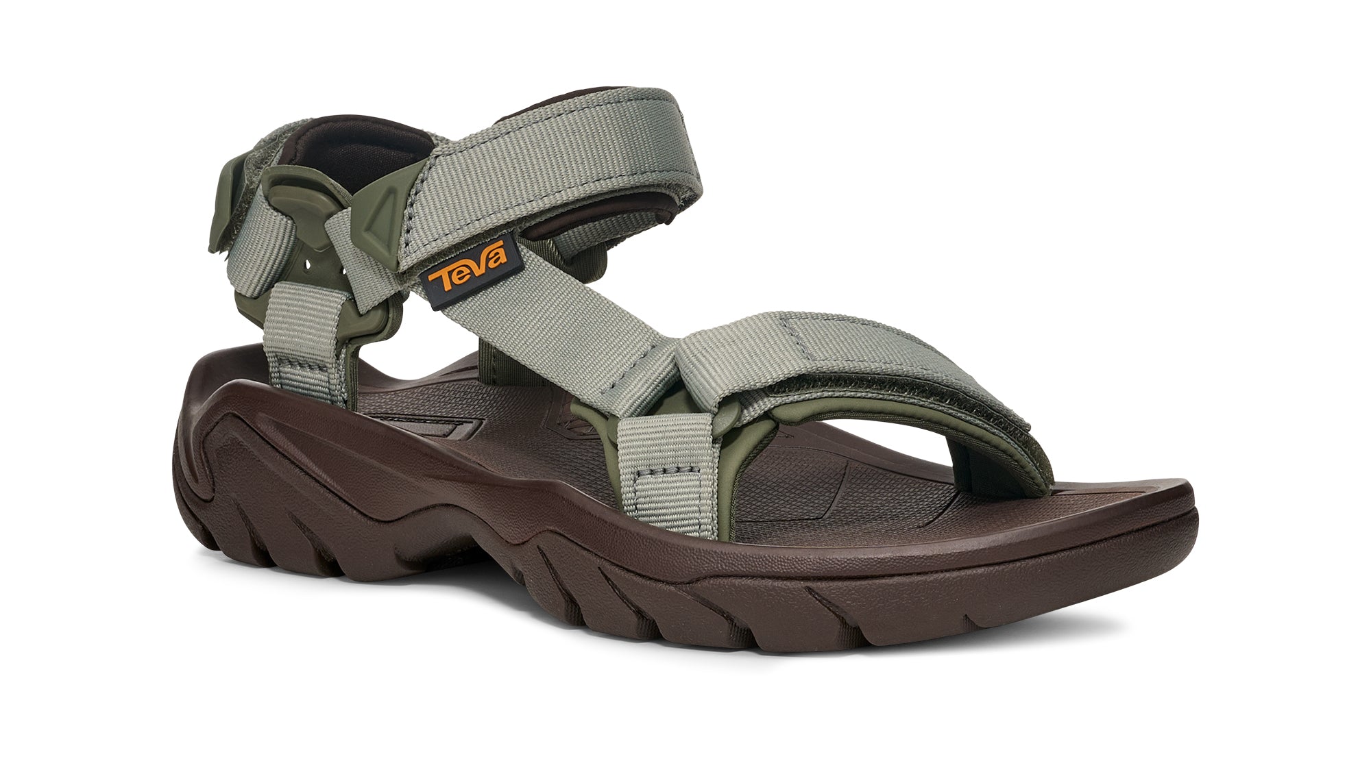 Green sandal with brown sole on a white background