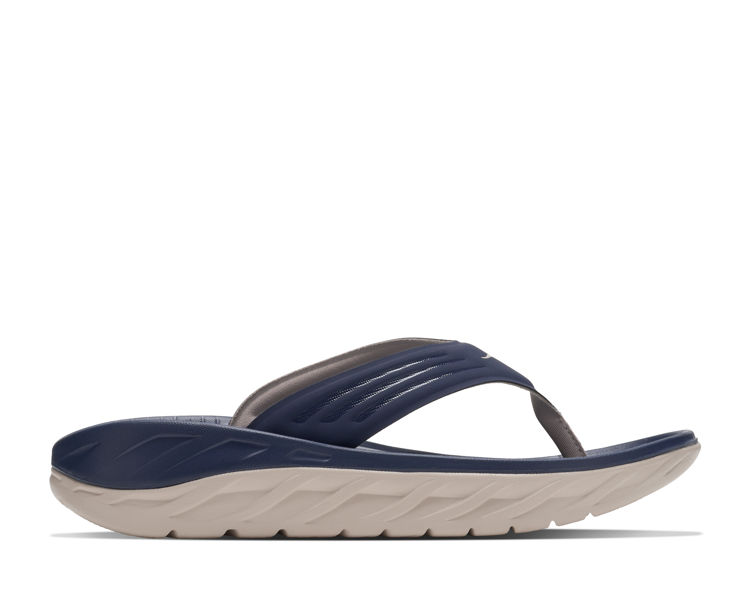 Navy and beige sandal on a white background