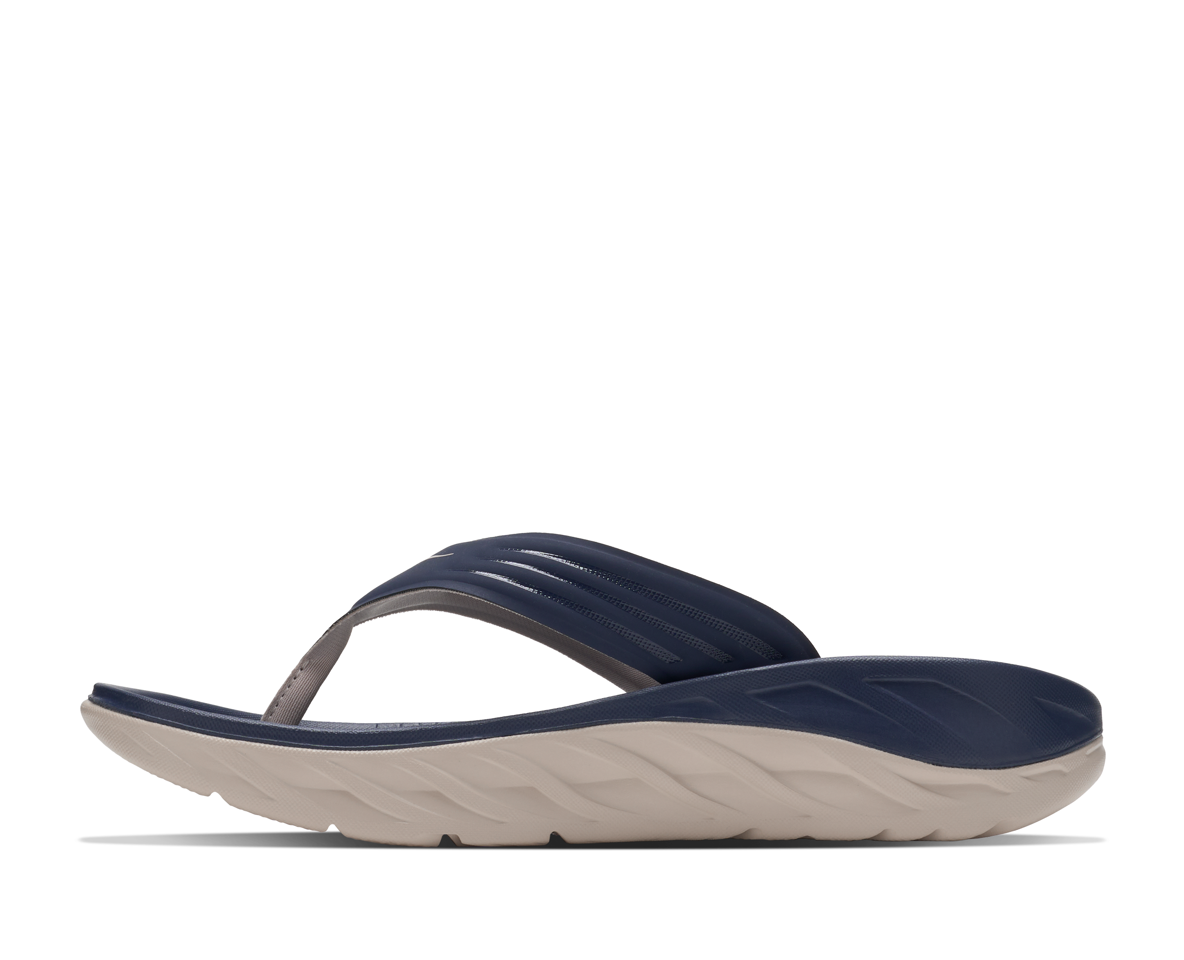 Navy and beige sandal on a white background