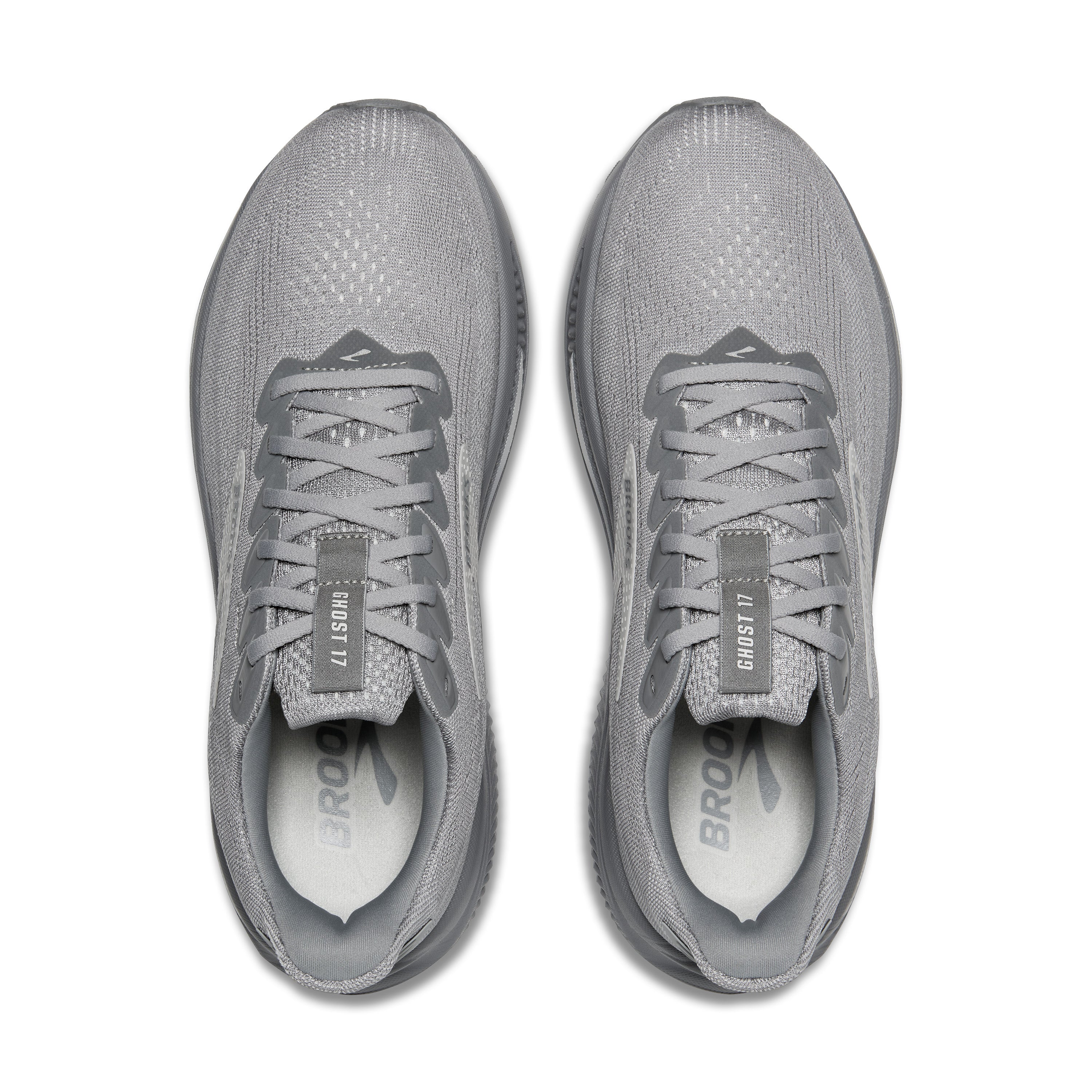 Pair of gray running shoes on a white background