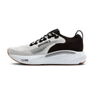 Black and white running shoe with 'Brooks' branding on a white background