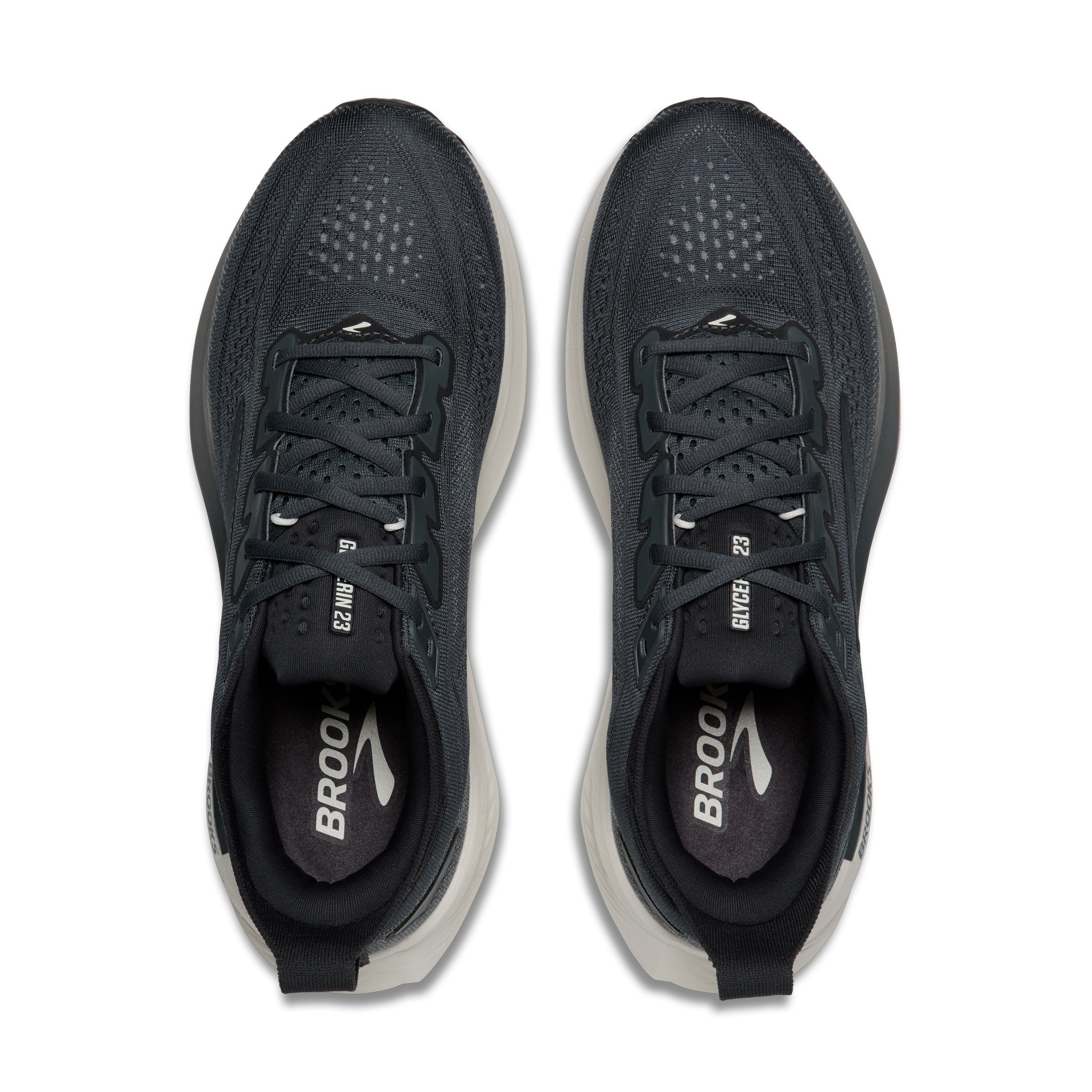 Black running shoes with visible 'Brooks' logo on a white background