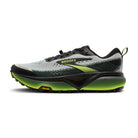 Brooks running shoe with green sole on a white background