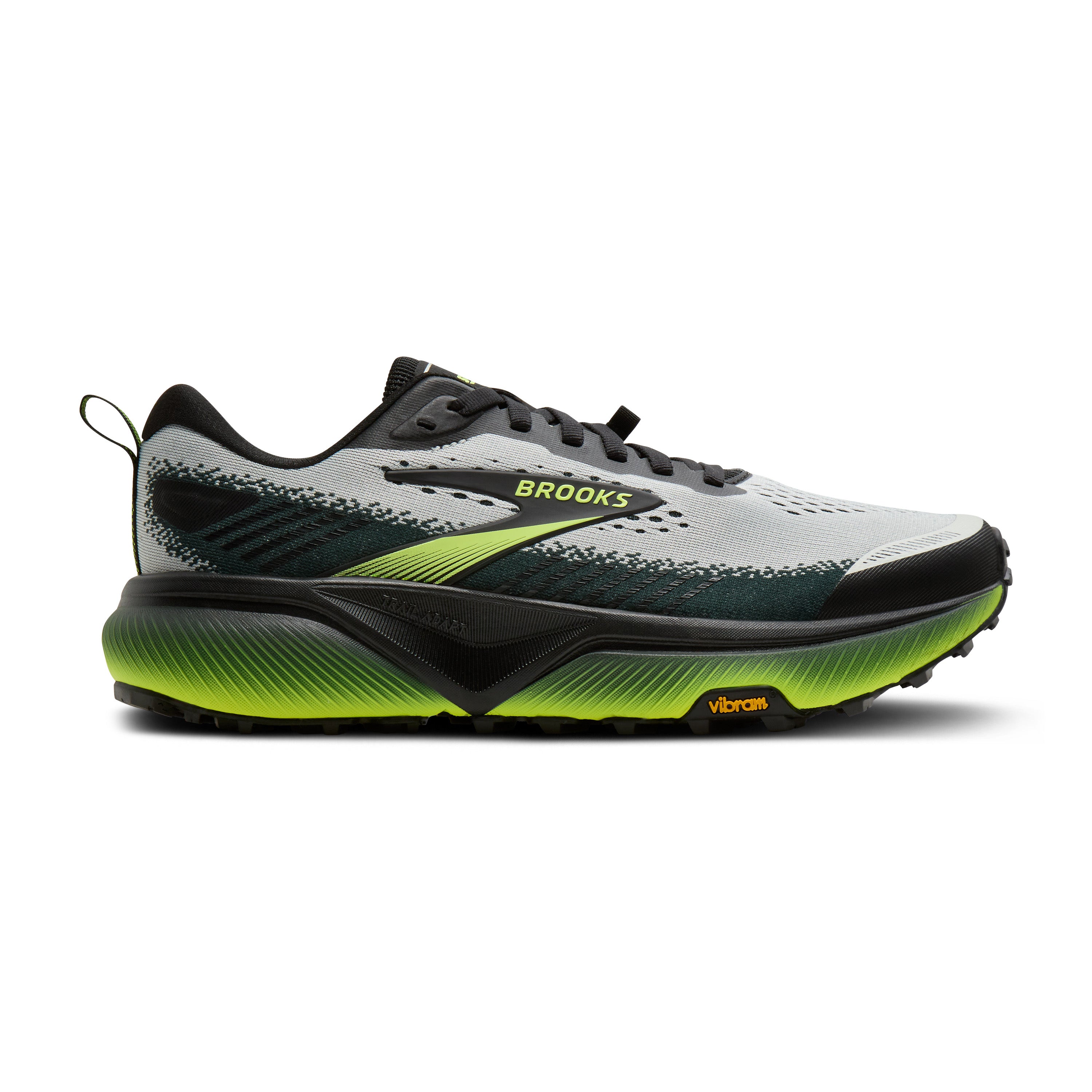 Brooks running shoe with green sole on a white background