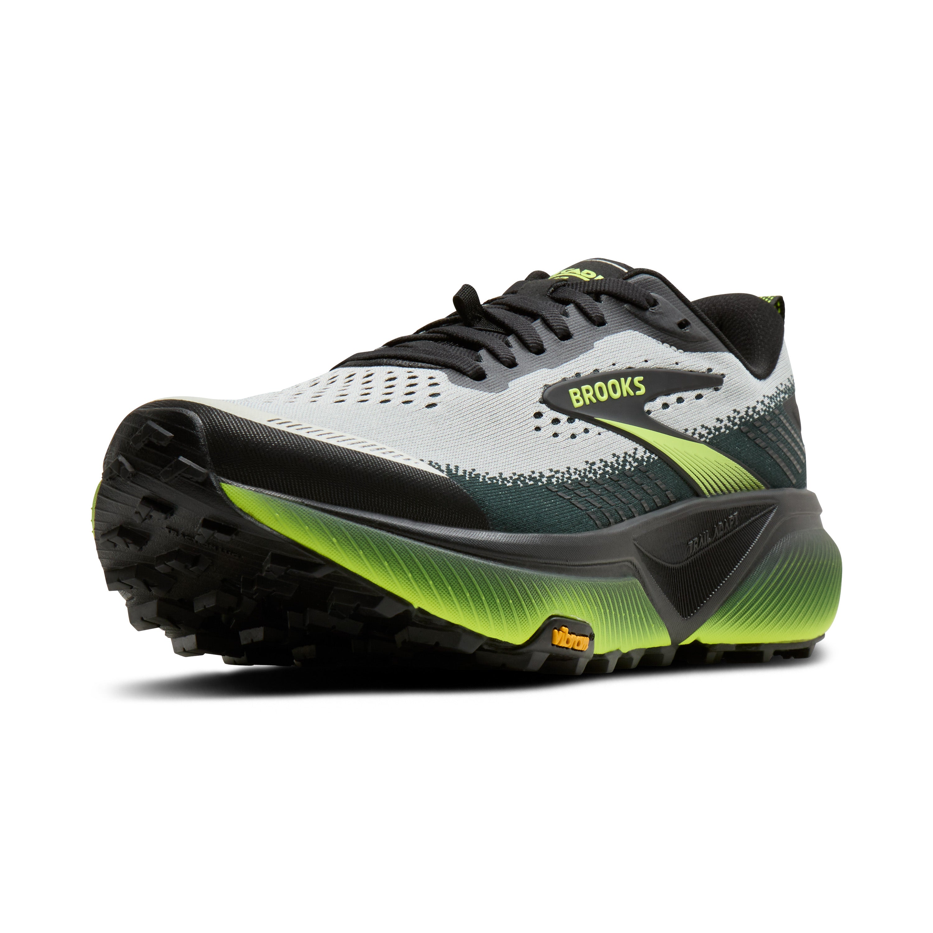 Brooks running shoe with white, black, and green design on a white background