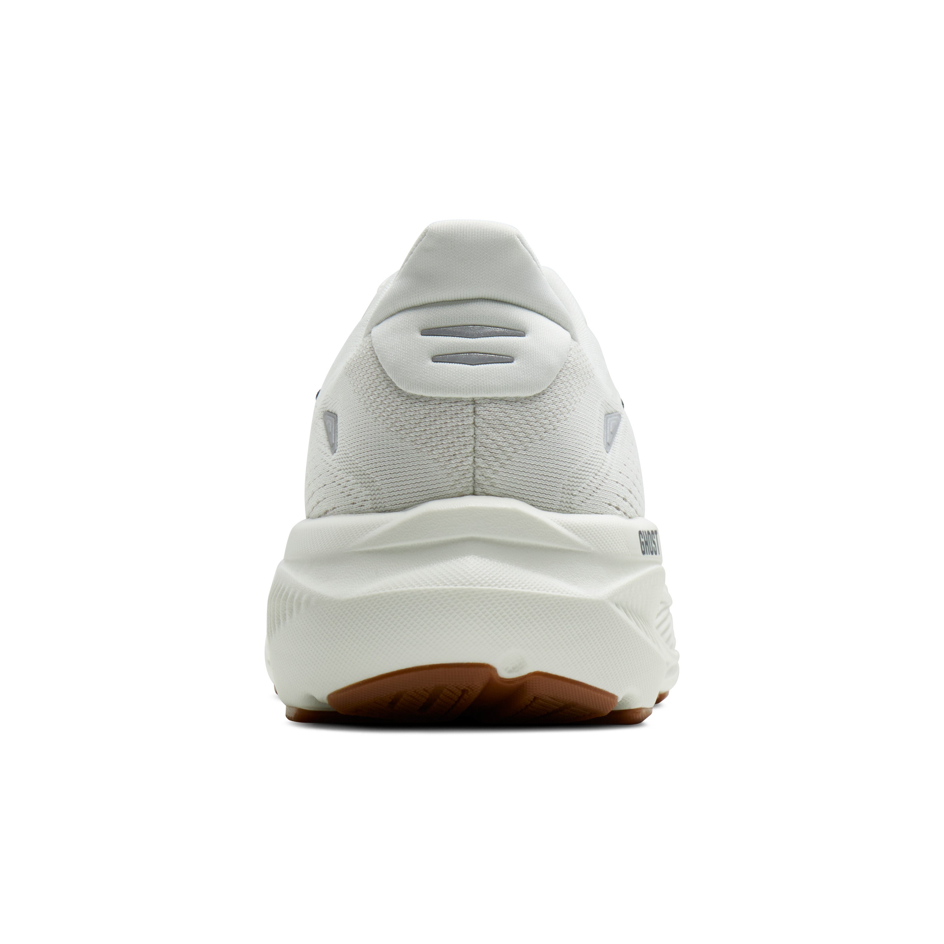 White sneaker with brown sole on a white background