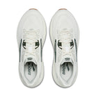 White running shoes with black branding on a white background