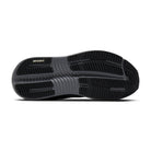 The black rubber outsole of a Brooks shoe, showing the textured tread pattern and the white BROOKS logo on the heel, set against a plain white background.