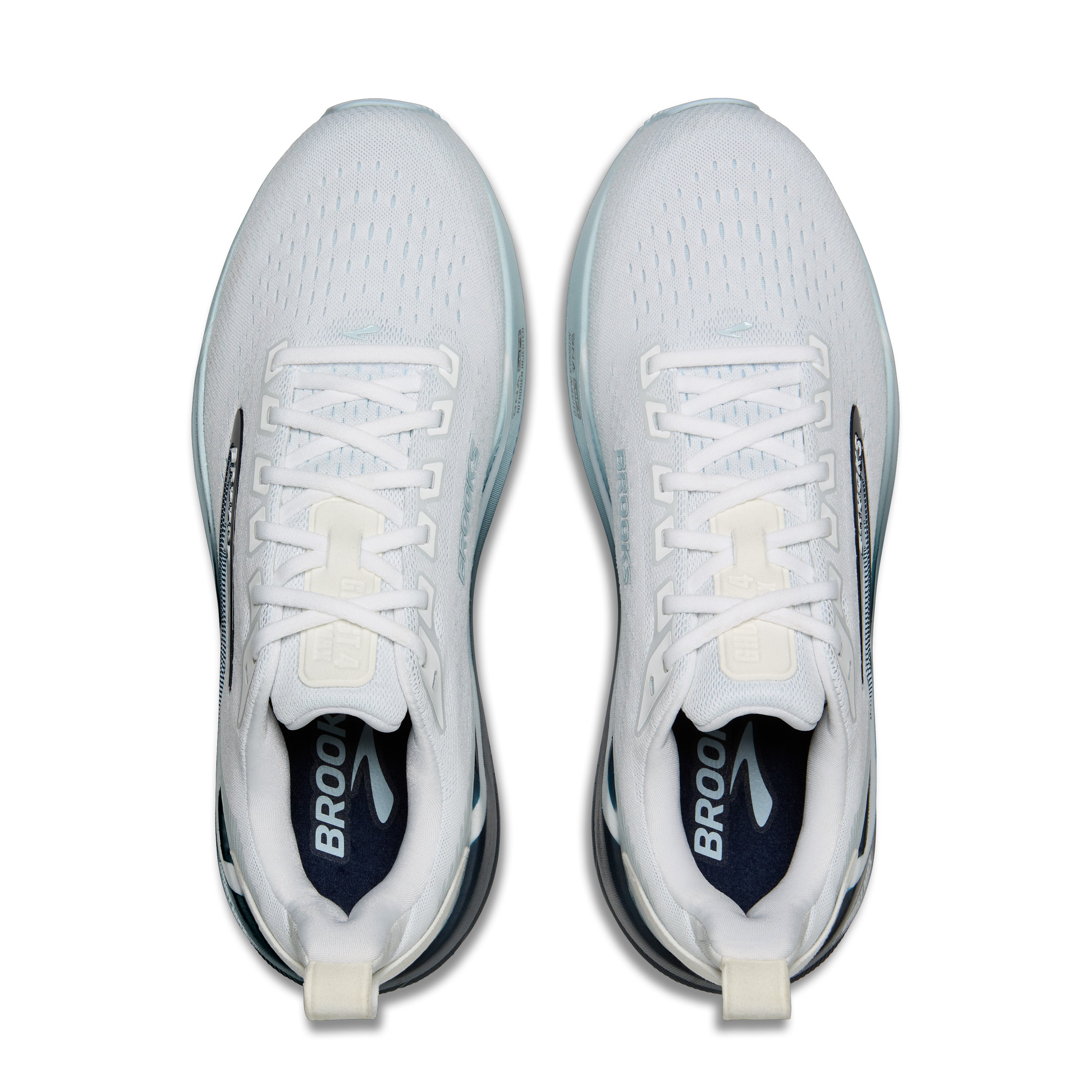 White running shoes with visible branding on a white background