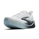 White running shoe with blue sole on a white background
