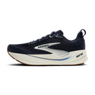 Navy running shoe with white sole on a white background