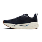 Navy running shoe with white sole on a white background