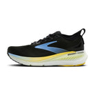 Black running shoe with blue accents and a yellow sole on a white background
