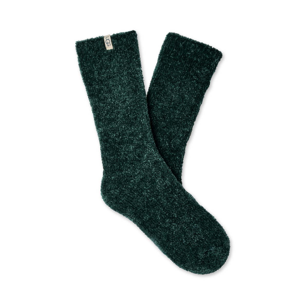 A pair of dark forest green fuzzy socks with a small white brand tag on the cuff, displayed against a solid white background.