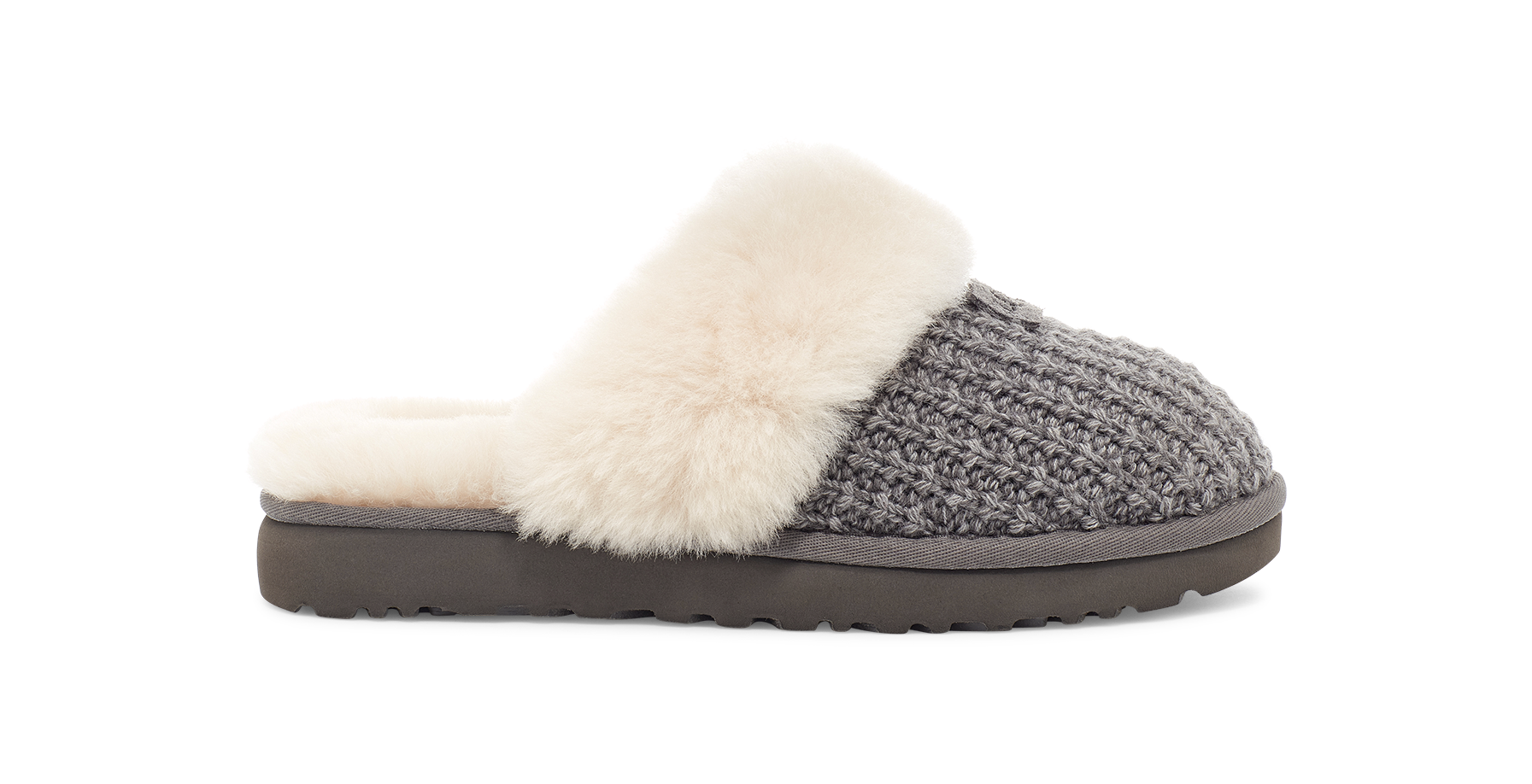 A single knit slipper with a chunky gray knit upper, a soft cream faux-fur trim, and a dark brown sole, shown in profile against a white background.