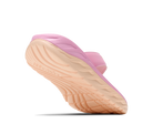 Pink sandal with a wooden sole on a white background