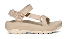 Beige sandal with multiple straps on a white background