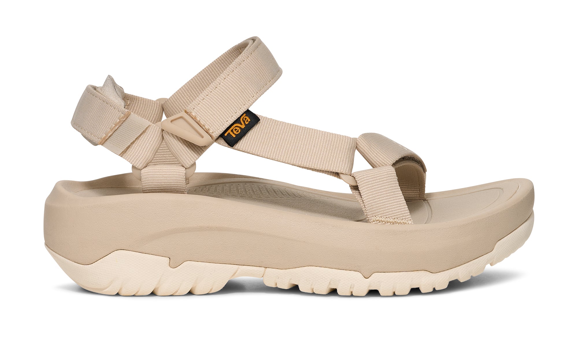 Beige sandal with multiple straps on a white background