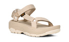 Beige sandal with 'Teva' branding on a white background