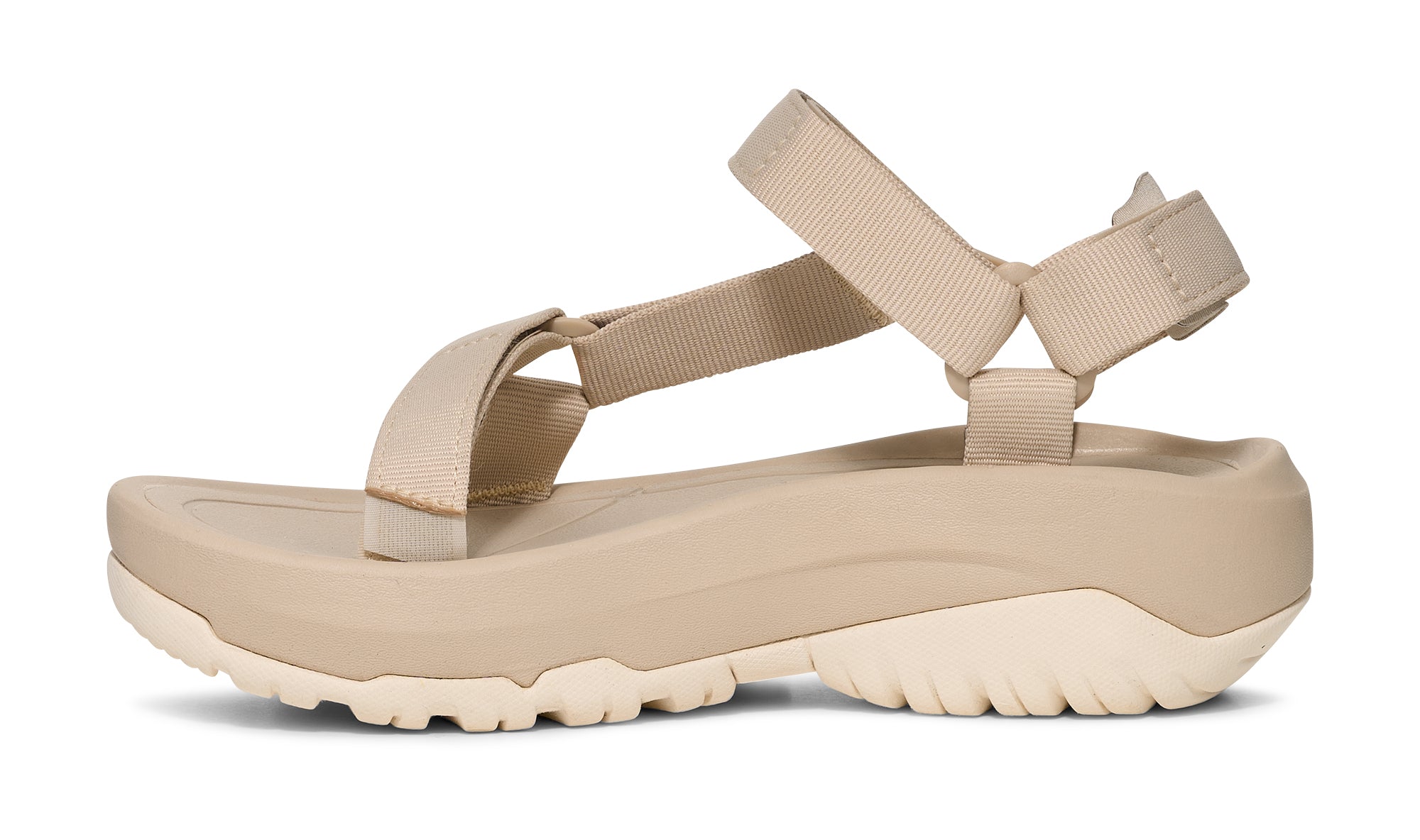 Beige sandal with multiple straps on a white background