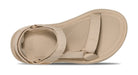 Beige sandal with a strap on a white background