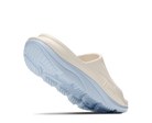 Light blue and beige shoe on a white background