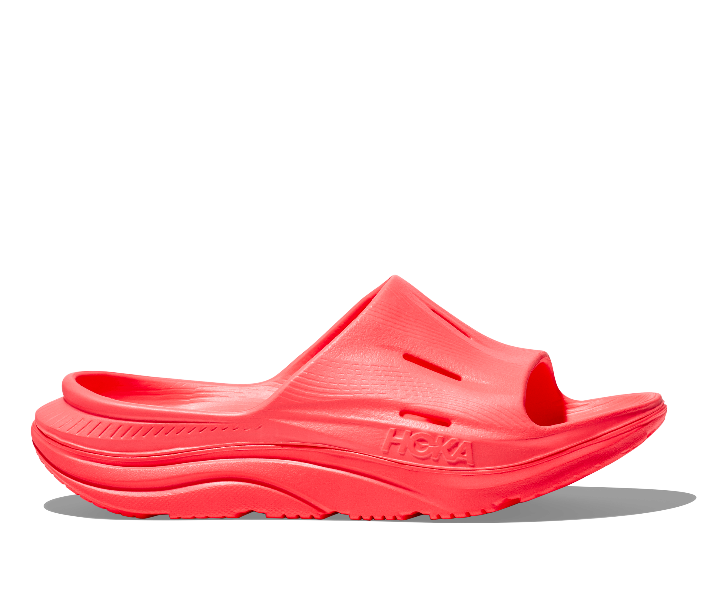 Red slide sandal with 'Hoka' branding on a white background